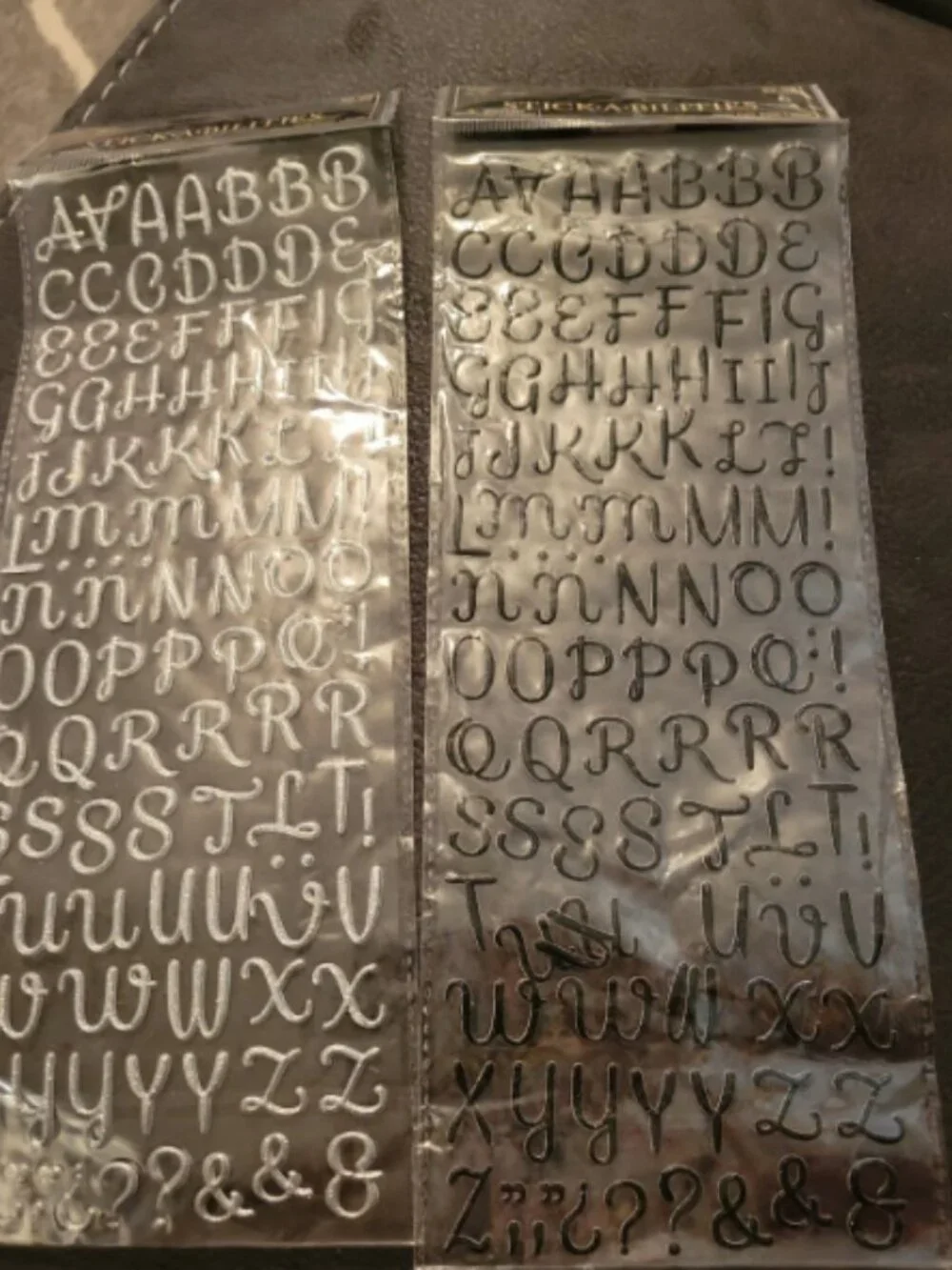 Stick a bilities alphabet stickers. Silver and black